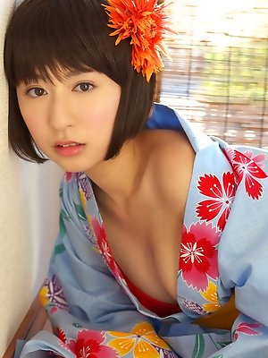 Rio Matsushita Asian shows sexy legs under geisha dress outdoor