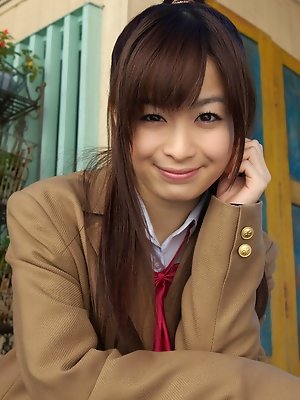 Hikari Yamaguchi Asian in uniform and coat wants to share choco